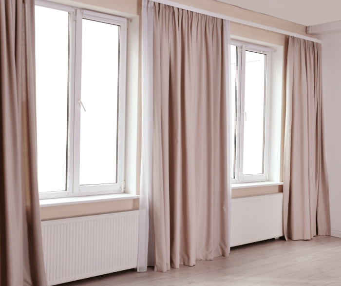 How to decorate a wall with two windows